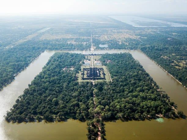 Temple ruins surrounded by jungle in Angkor Archaeological Park