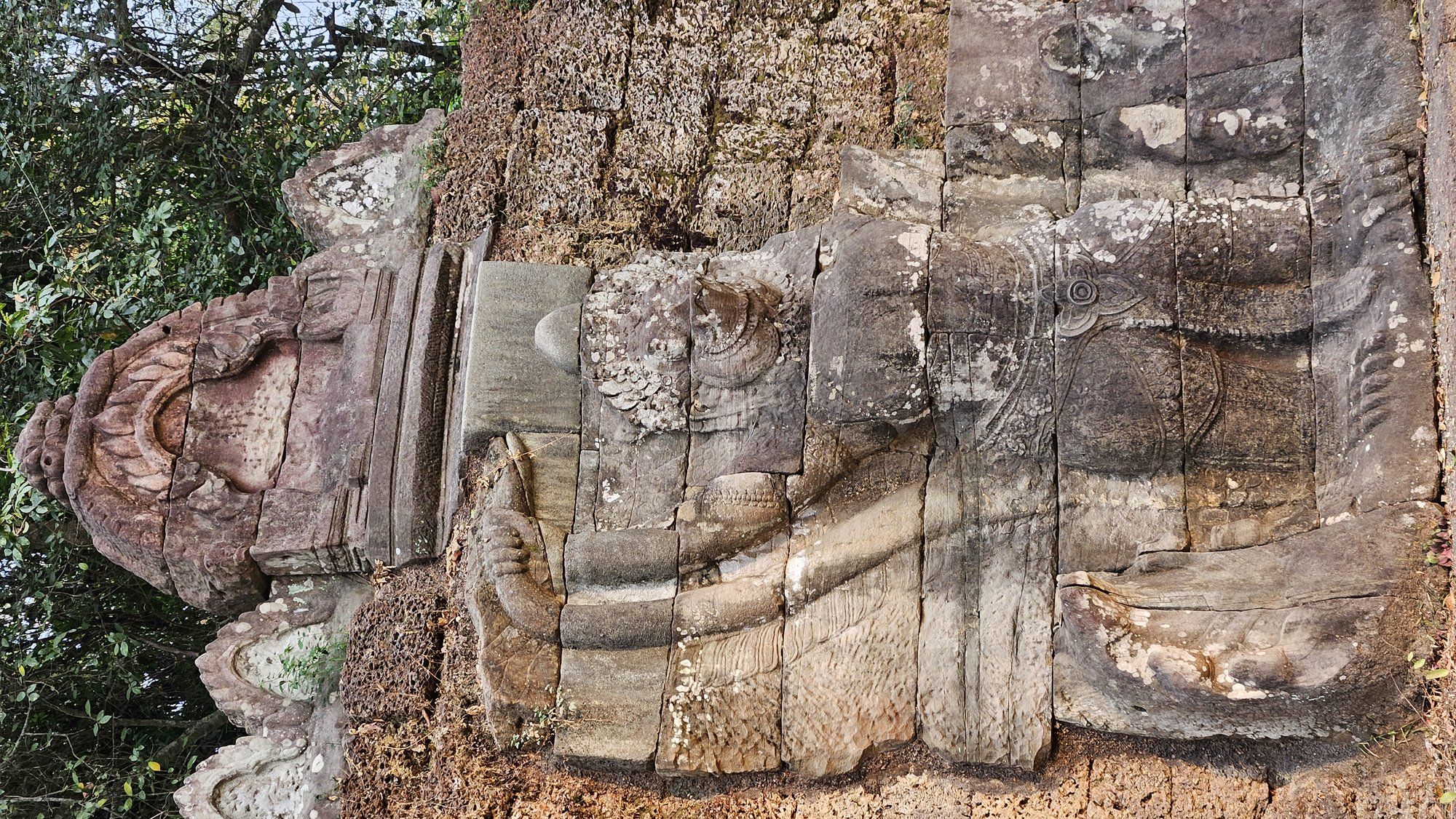 A naga balustrade lining a causeway at Angkor Thom