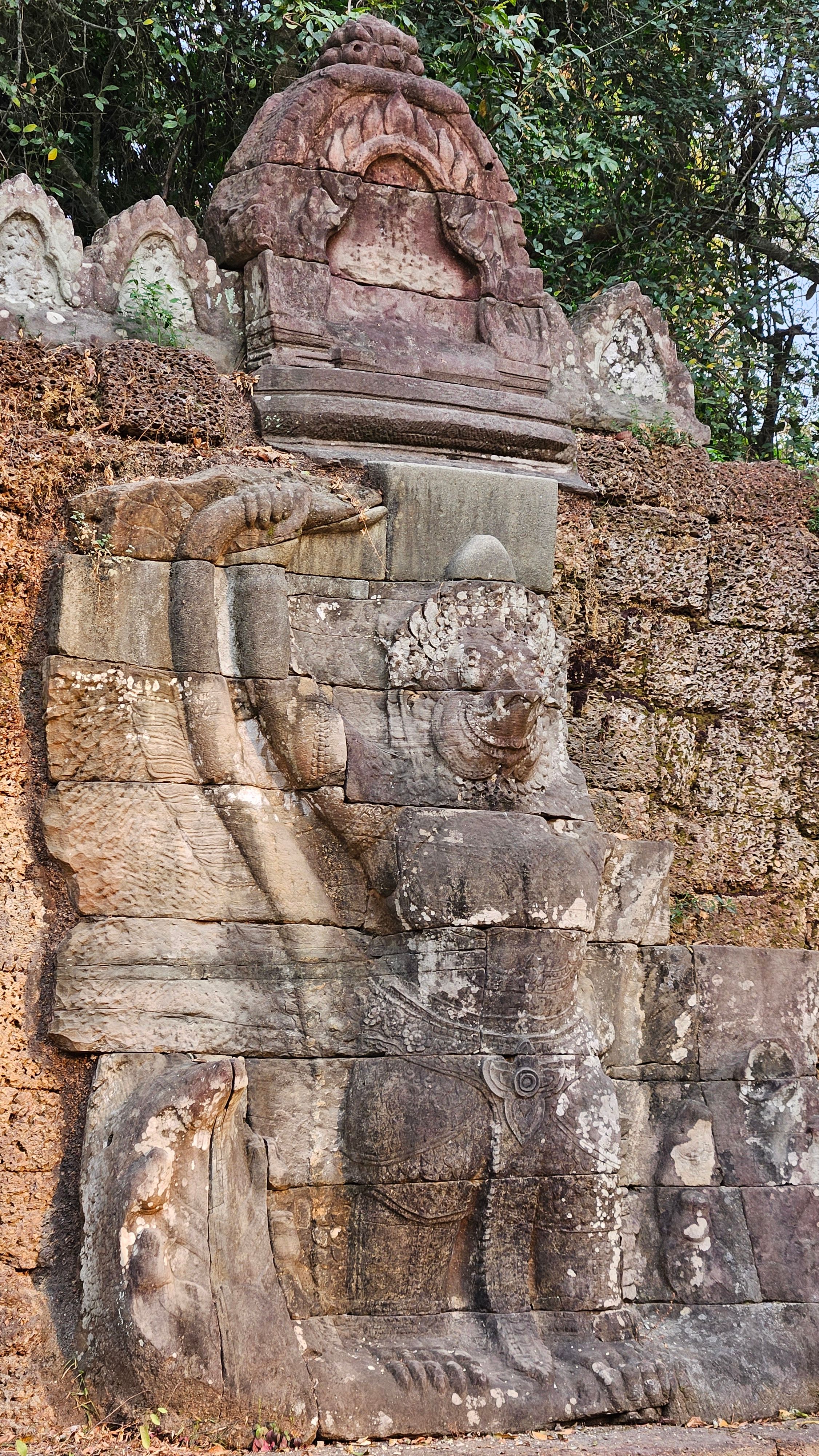 A naga balustrade lining a causeway at Angkor Thom
