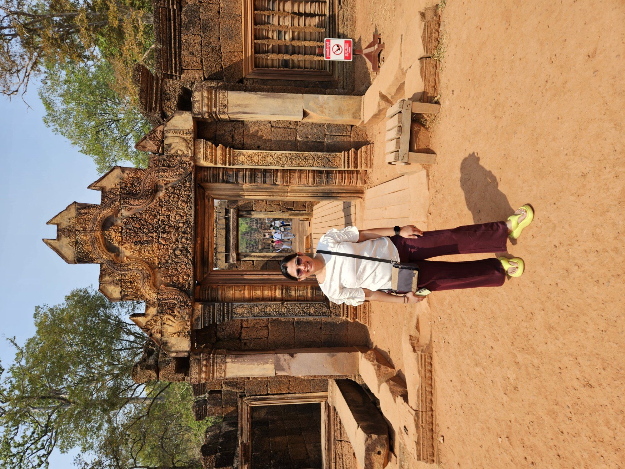A visitor at the gateway of Banteay Srei