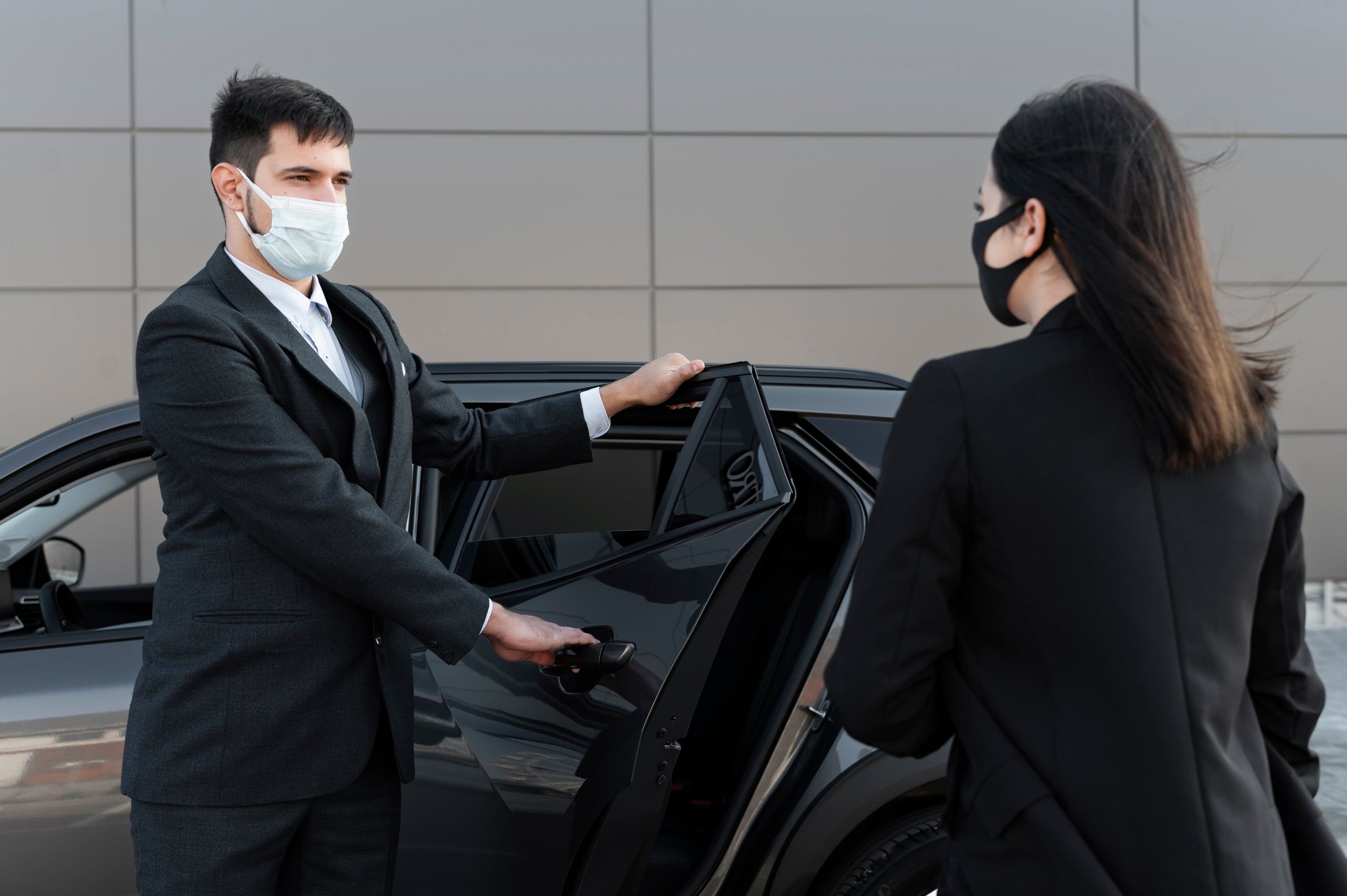 Business travellers boarding a vehicle