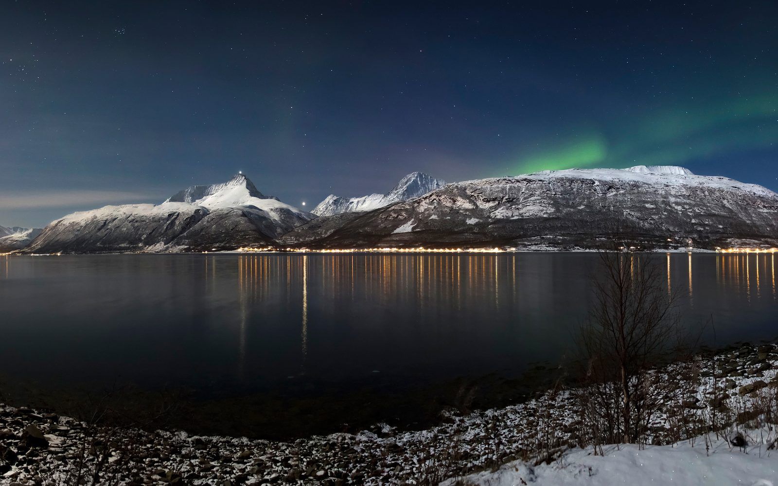 The northern lights over a Norwegian fjord