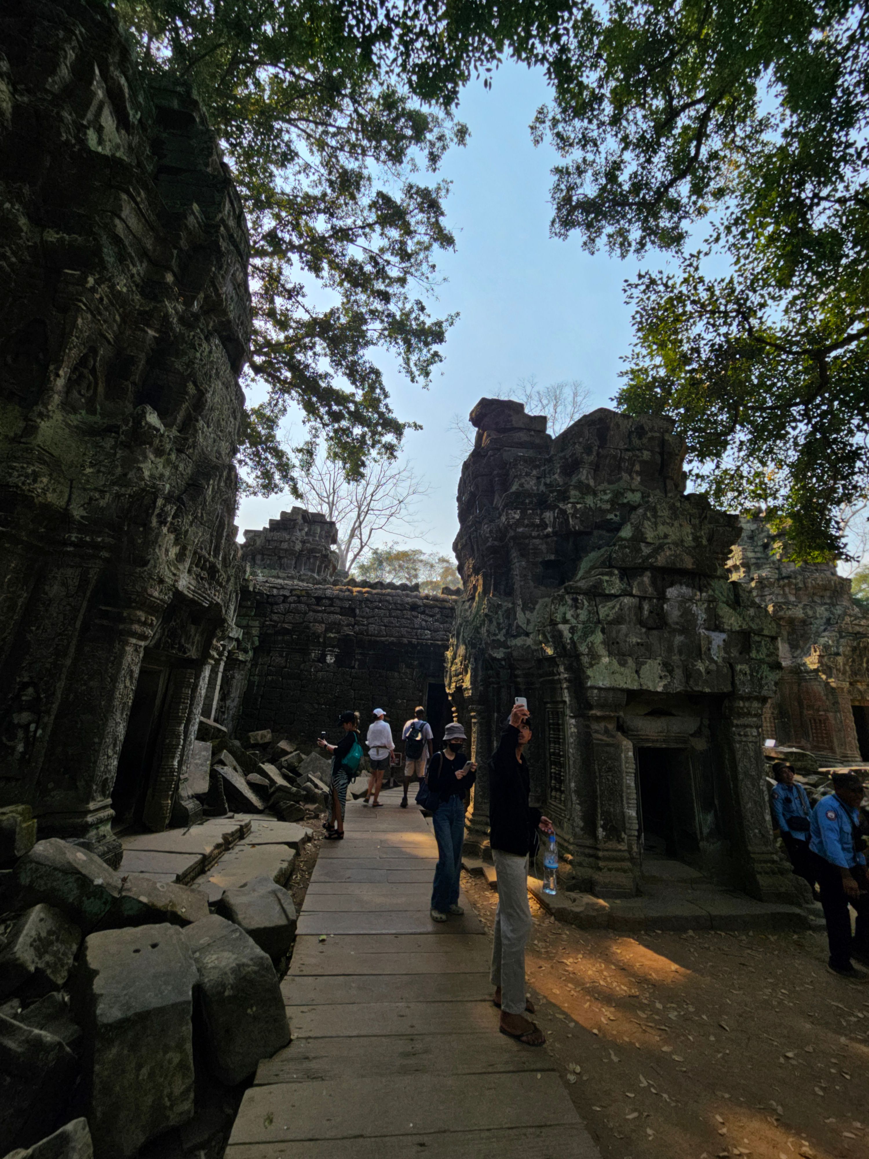 The walkway into Ta Prohm through collapsed stonework