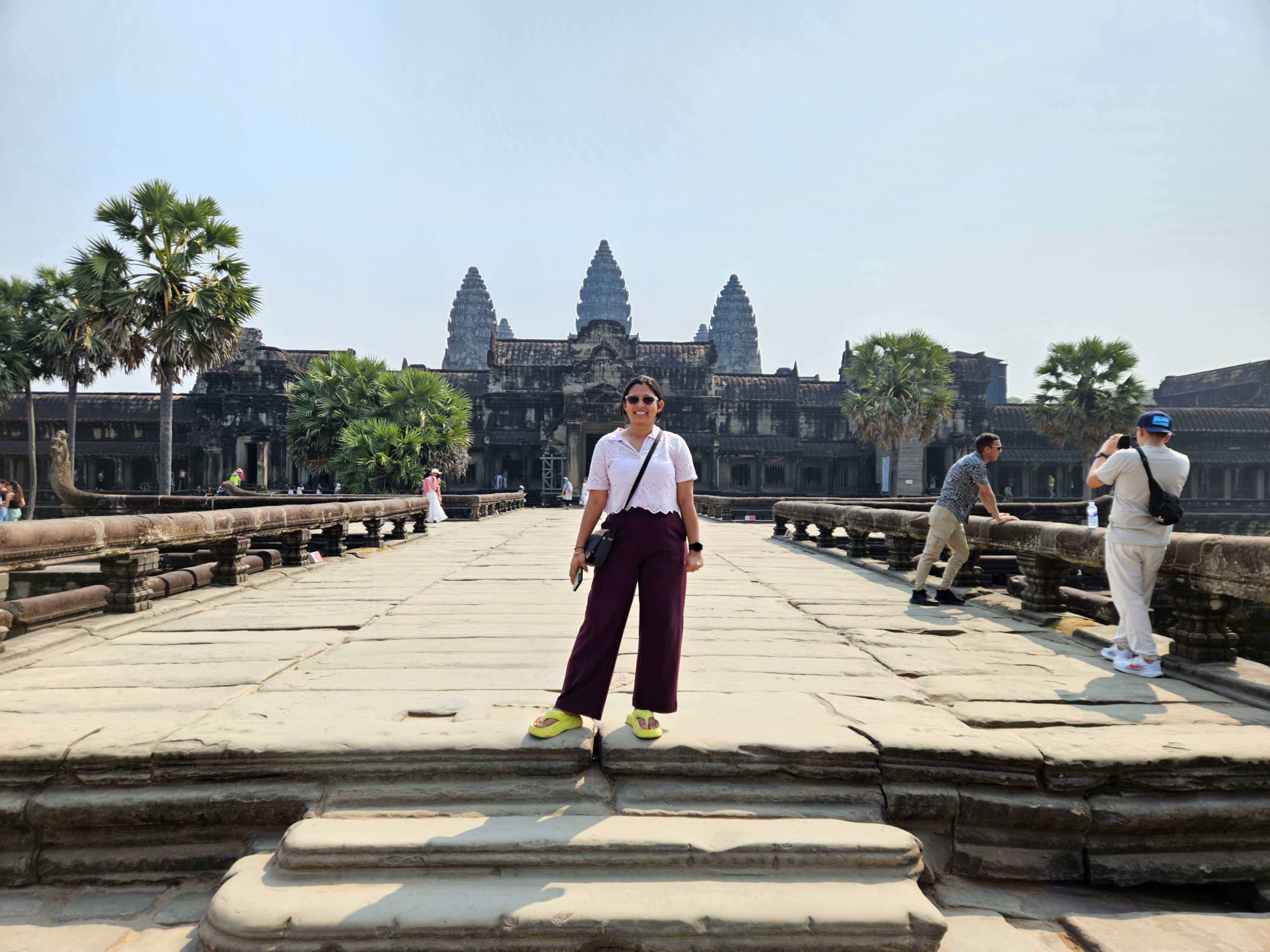 A traveller on the causeway leading to Angkor Wat